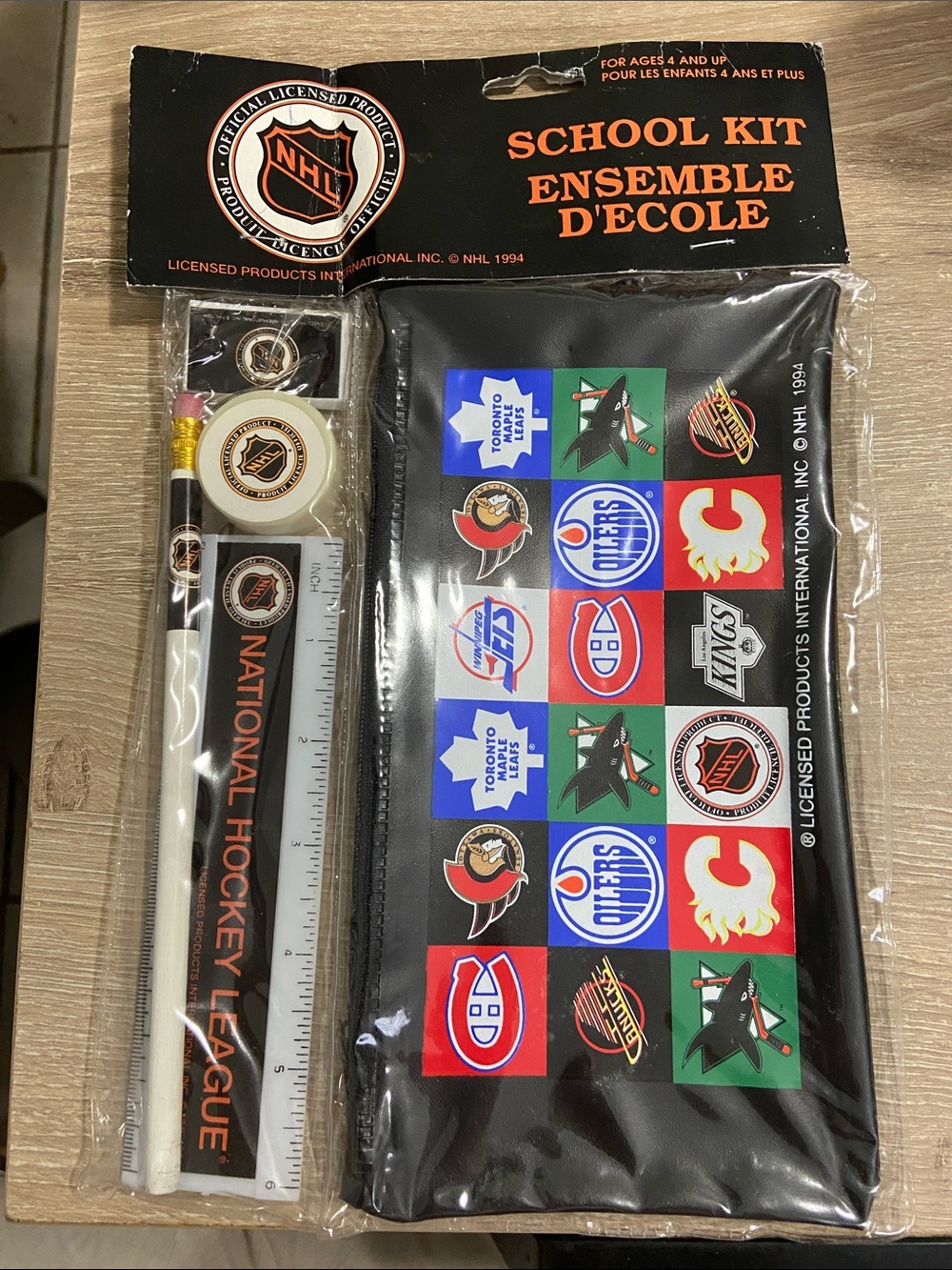 1994 NHL Black School Kit with Multi-Team Color Logo Grid